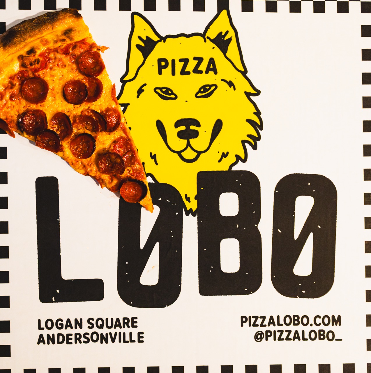 A slice of pepperoni pizza from Pizza Lobo featured in the bear sits on a box from the restaurant. 
