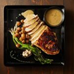 A perfectly cooked and tender turkey breast sous vide, ensuring optimal juiciness and flavor, resulting in a succulent centerpiece for your holiday feast