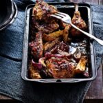 Chicken in Mustard and Appelstroop served in a skillet with a fork