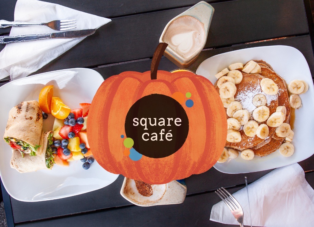 Two pumpkin dishes on a table with a pumpkin decal in the center.