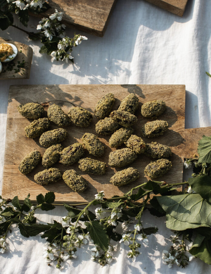 TABLE Magazine Goat Cheese Stuffed Dates A set of goat cheese stuffed dates on a cutting board