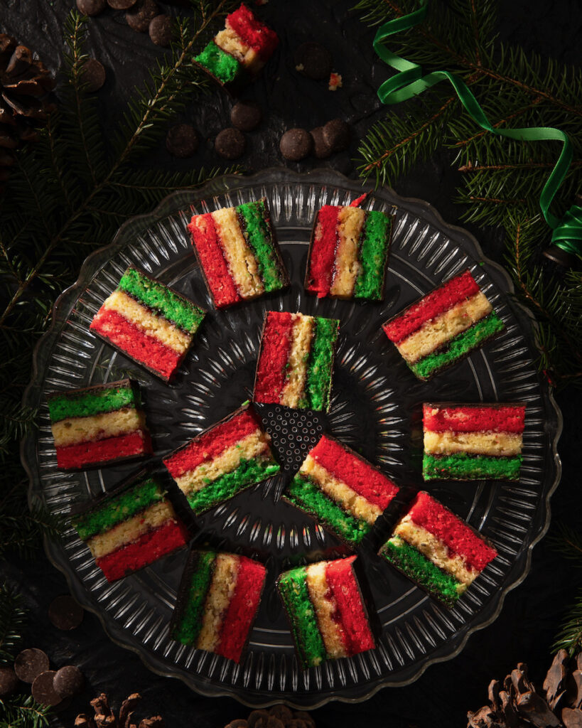Italian rainbow cookies arranged into a spiral