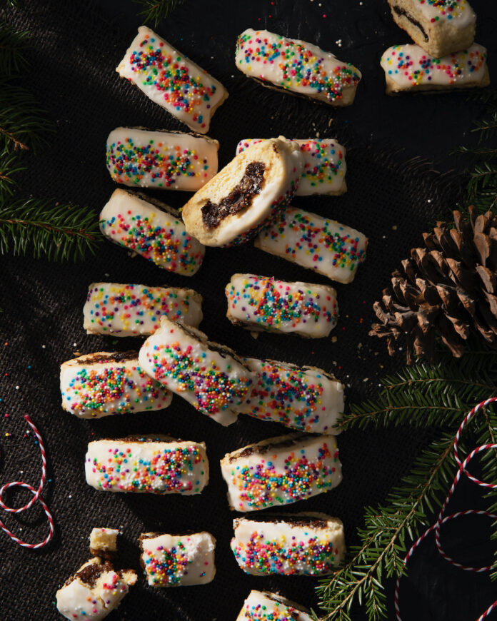 Cuccidati, Sicilian fig cookies, on a brown background
