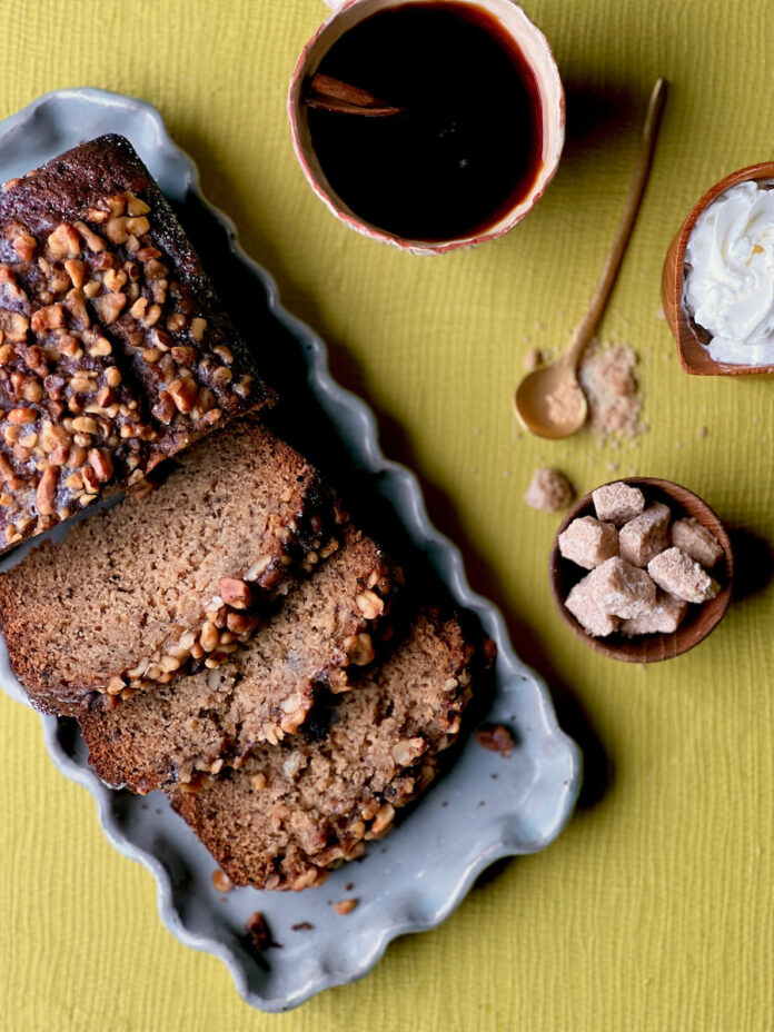 Easy Banana Bread Banana bread on a yellow background