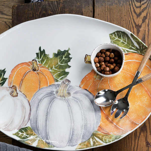 A plate with many different pumpkins on it