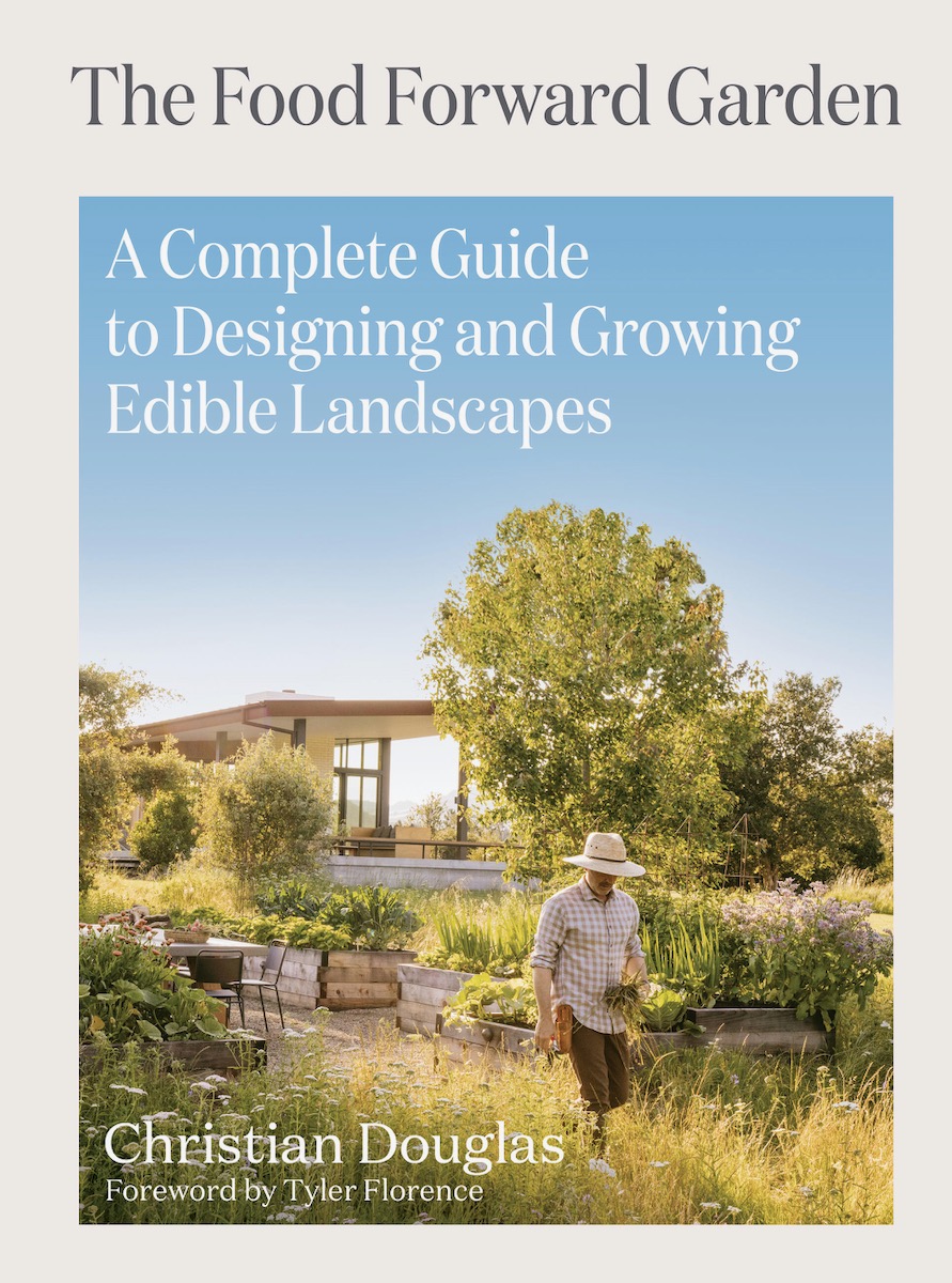 The cover of The Food Forward Garden, a landscape with a blue sky