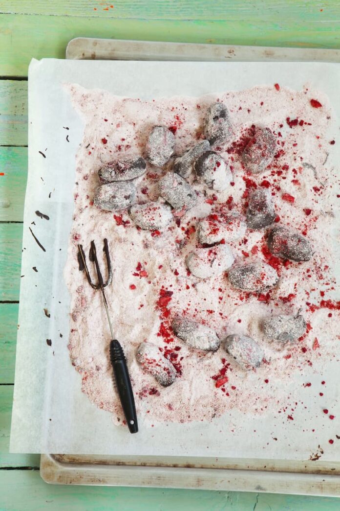 Raspberry-Chocolate-Truffles Raspberry Chocolate Truffles served in a white tray with a green wooden background