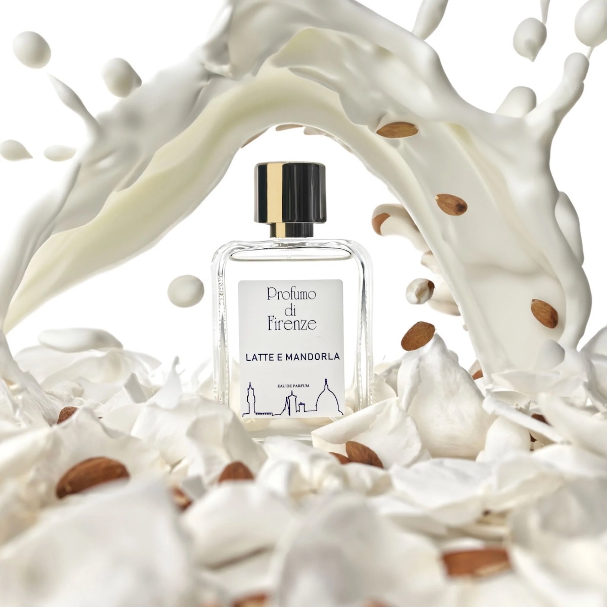 A bottle of Latte e Mandorla by Profumo di Firenze, staged with milk and almonds 