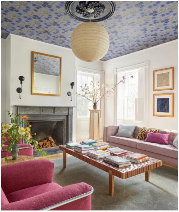 A room in a Salem, MA home designed by Colleen Simonds, with a blue and white ceiling