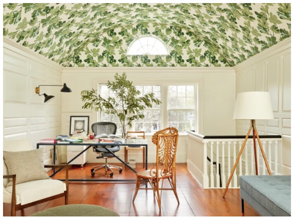 A green and white ceiling in an office space in a home designed by Colleen Simonds