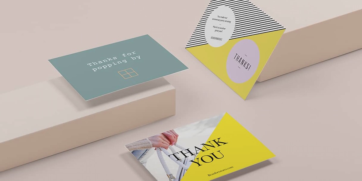 A set of customizable thank you cards in yellow, green, and tan