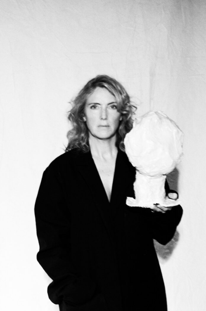 A black and white image of designer Faye Toogood staring right into the camera