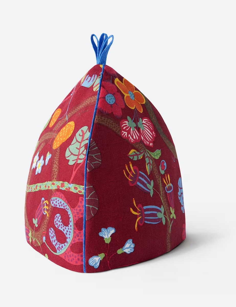 A red embroidered cozy from Svenkst Tenn
