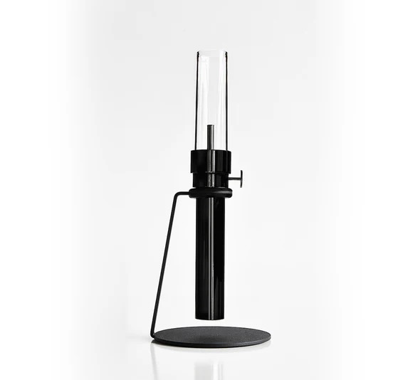 A black oil lamp staged on a white background from 2Modern