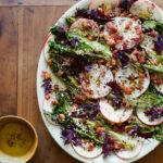A salad drizzled with homemade za'atar and pancetta with bitter apples.