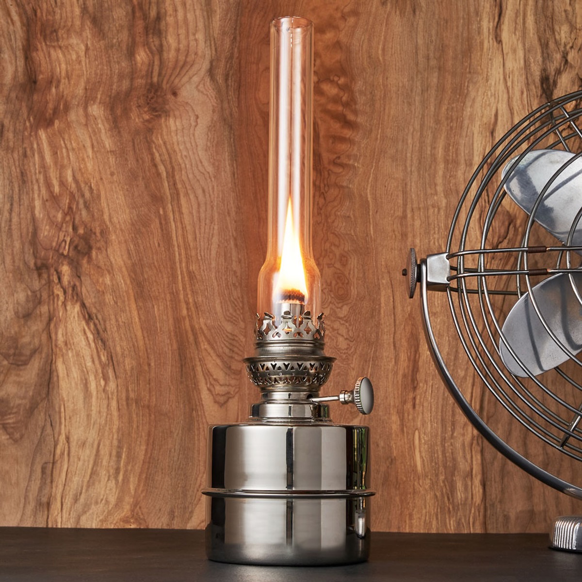 A Garrett Wade lamp against a wooden wall