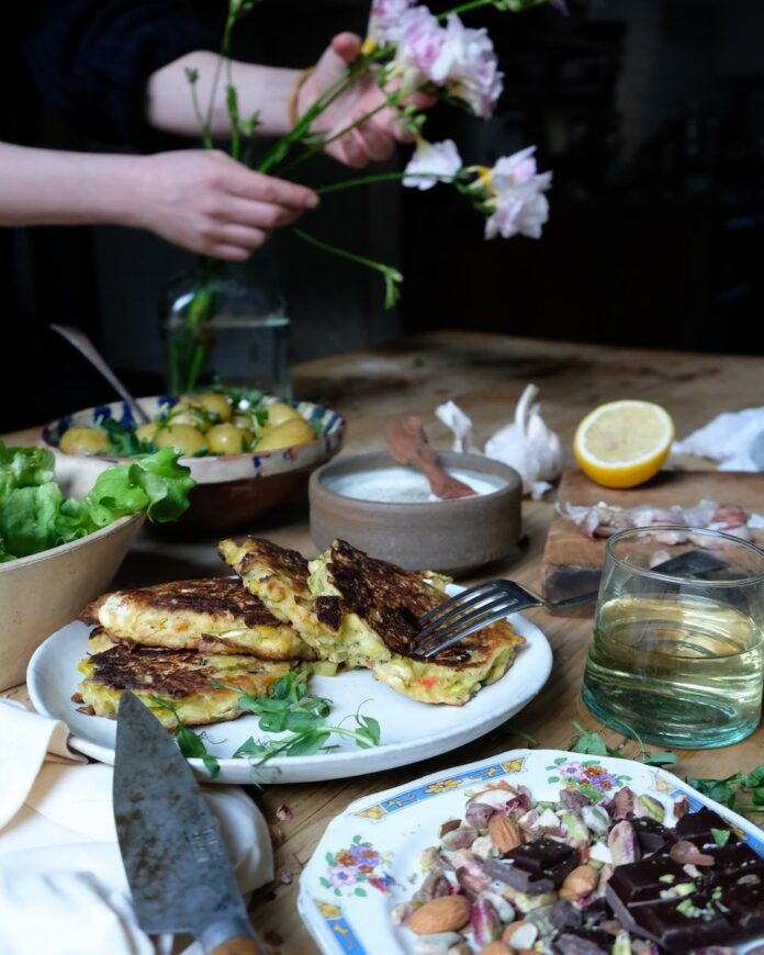 Leeks, feta, chili, and dill fritters on a spring table.