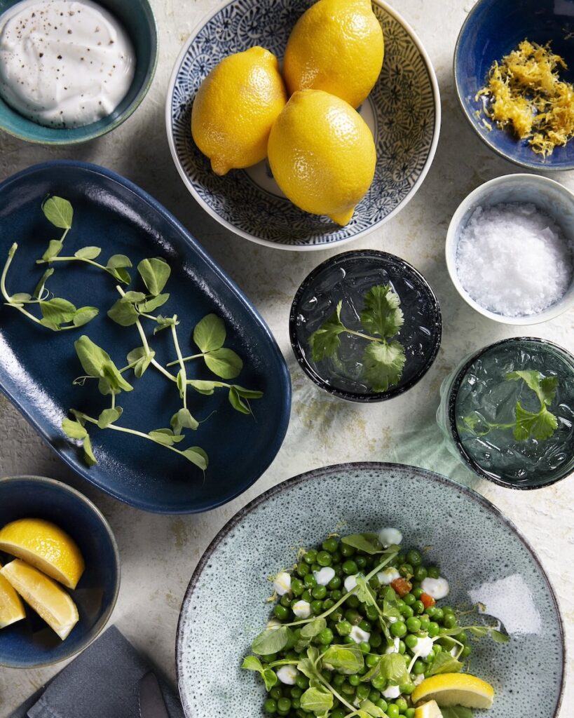 A set of plates of peas with soffritto.