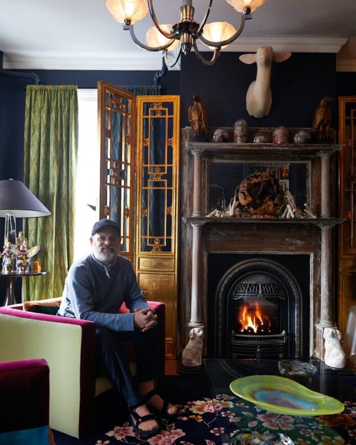 Richard Saja in his studio, surrounded by his design inspirations.