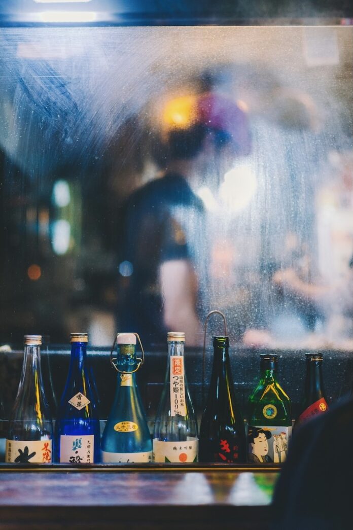 Sake being served in a Japanese restaurant.