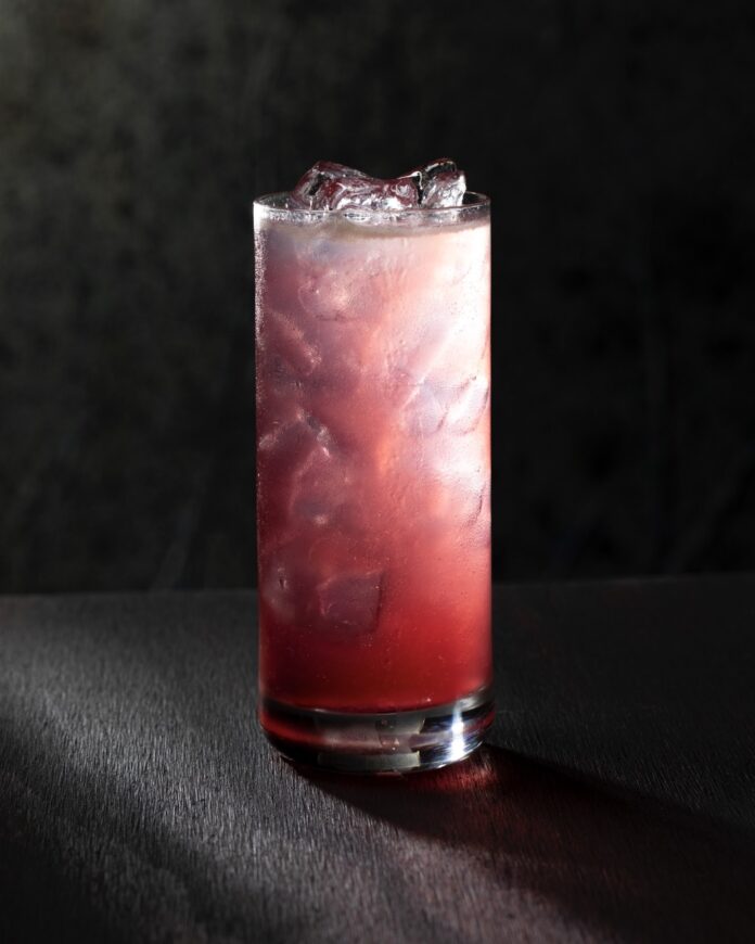 A pink and white cocktail for 28 years later representing the virus,