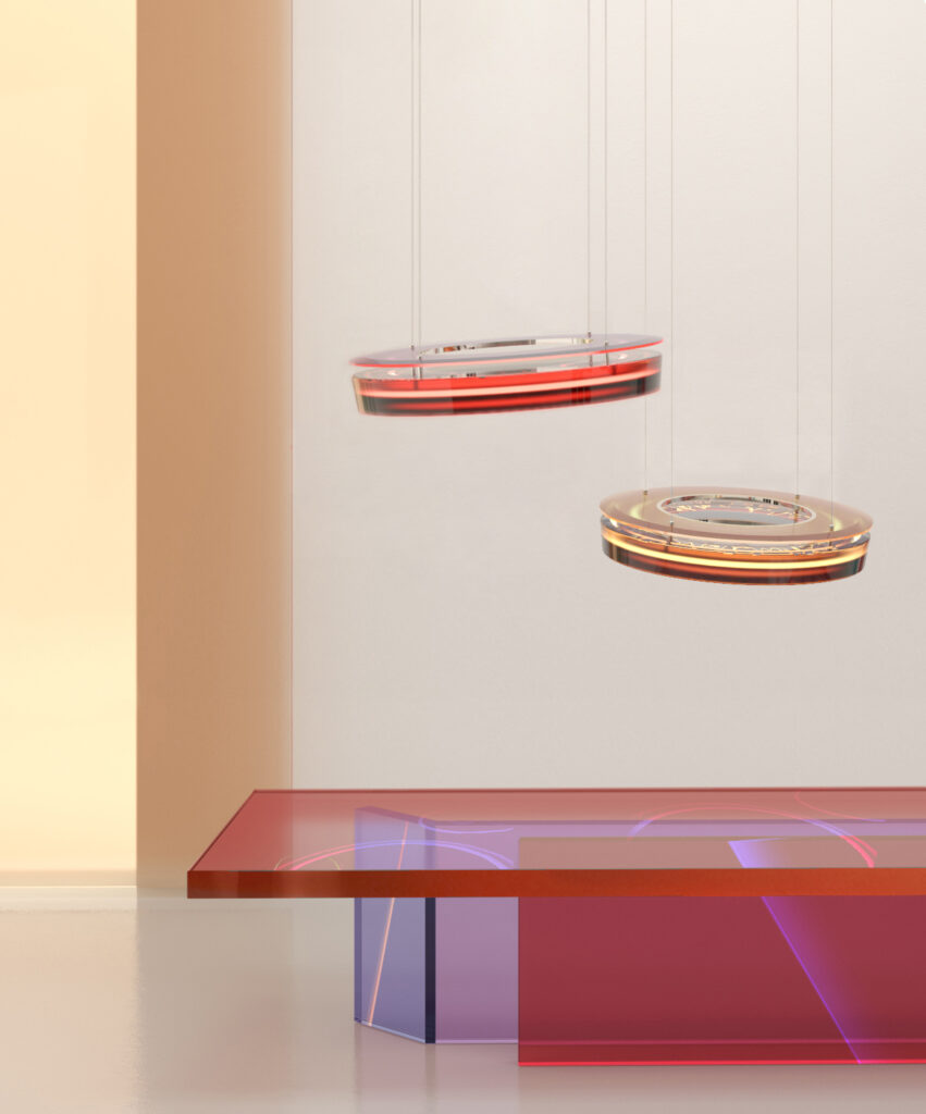 Draga & Aurel Phebe pendant lamps. Almost look like flying saucers. In red and yellow.