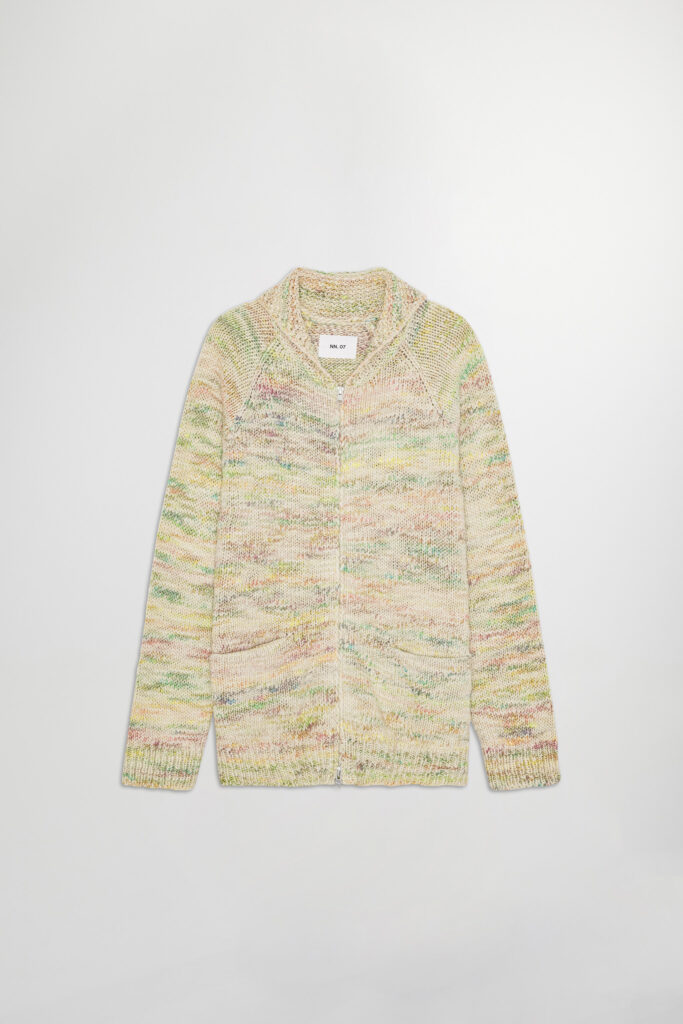 Space-dyed cotton yarn is knitted into this intriguing cardigan. The color palette is simultaneously seductive and upbeat