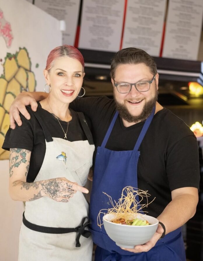 santa fe capital coal chefs holding food