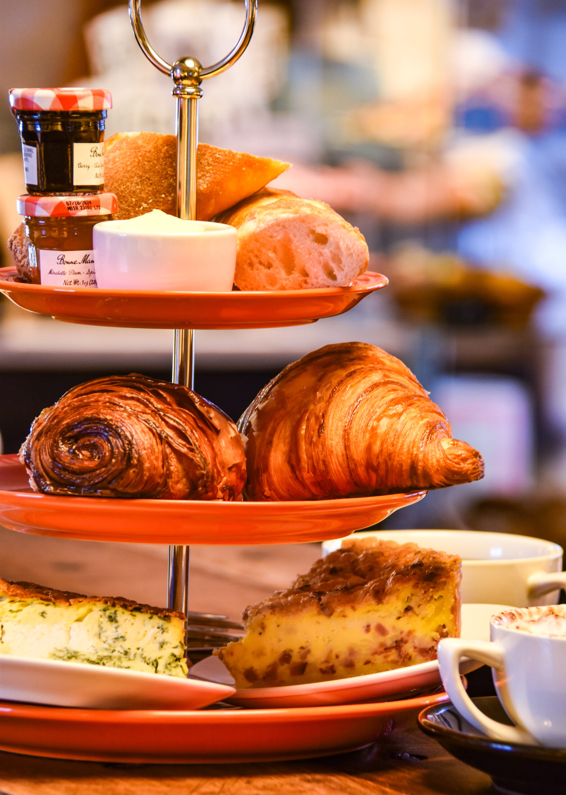 tower of baked goods with orange red hue