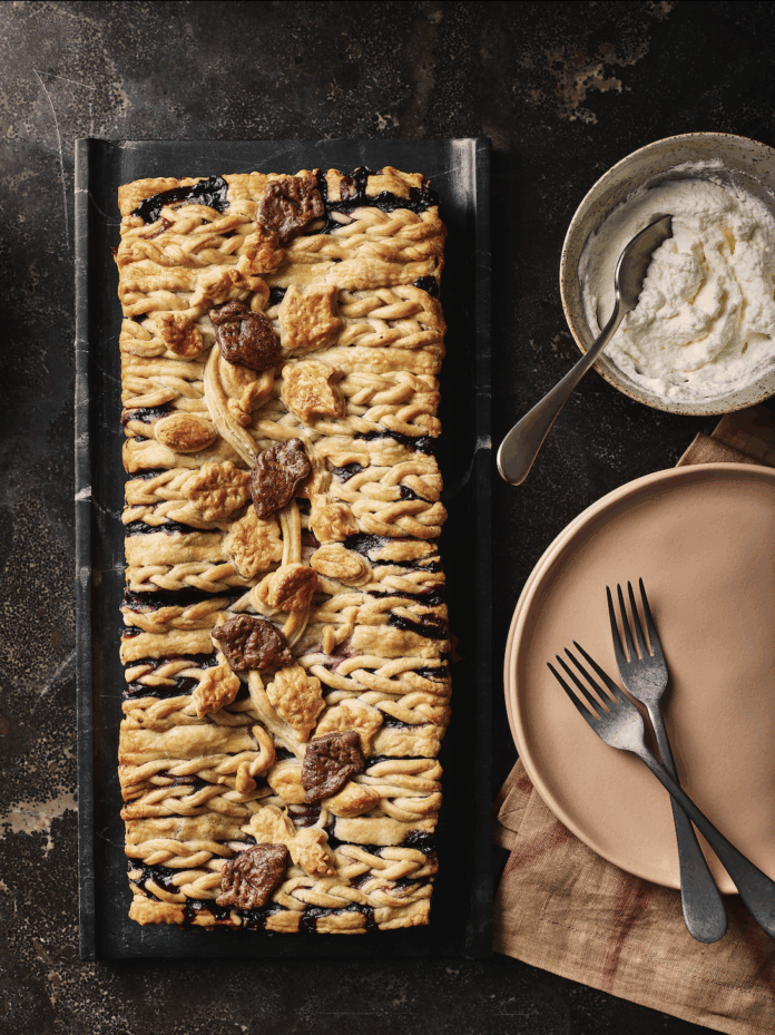 A Blueberry Maple Pie with leave lattice pie crust work on top.