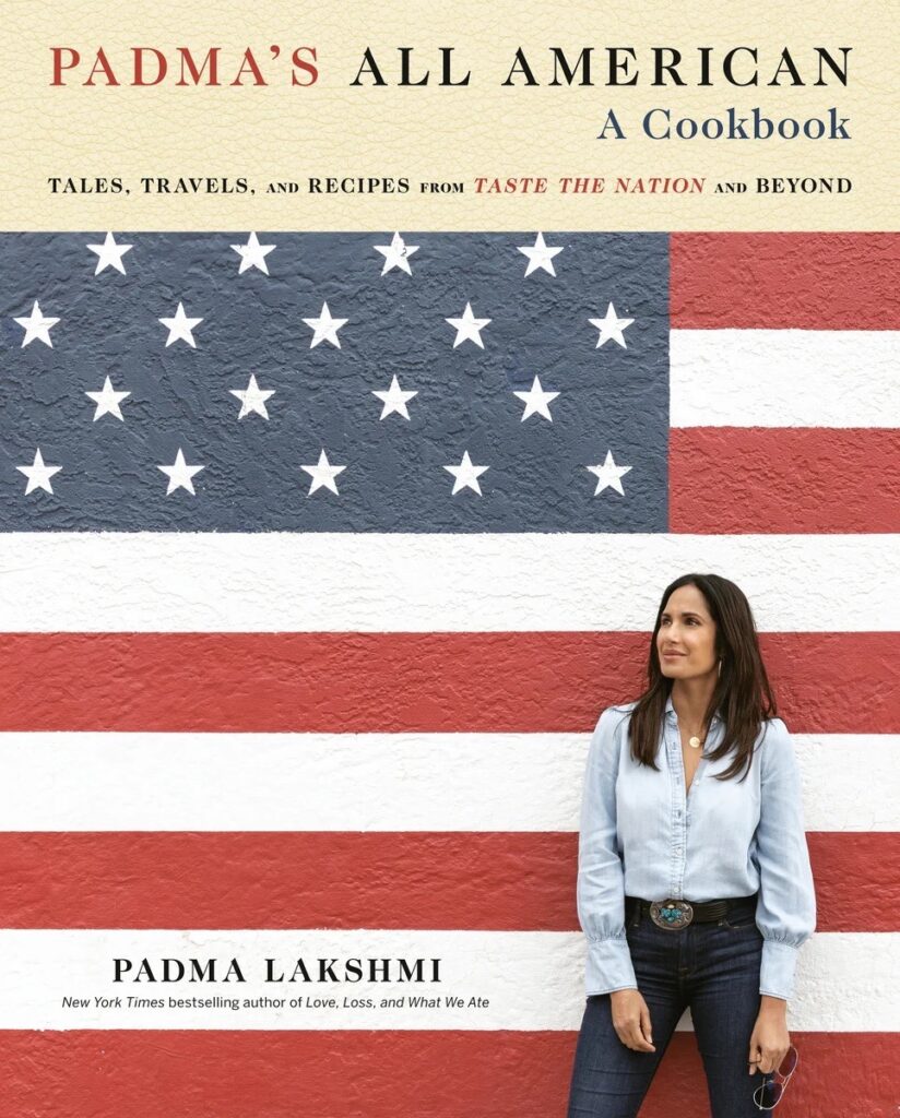 A cookbook cover of a woman in front of an American flag.