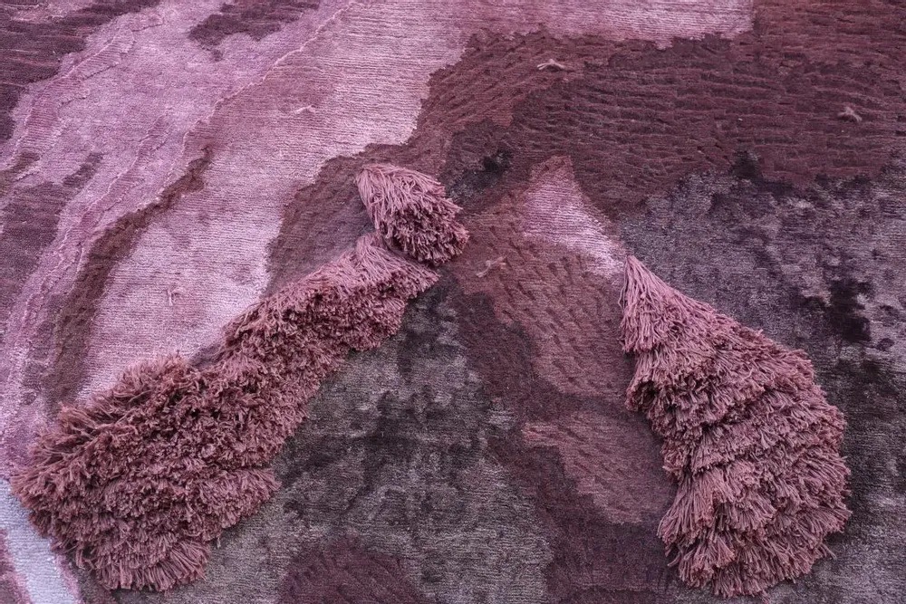 Various shades of purple as a rectangular rug.