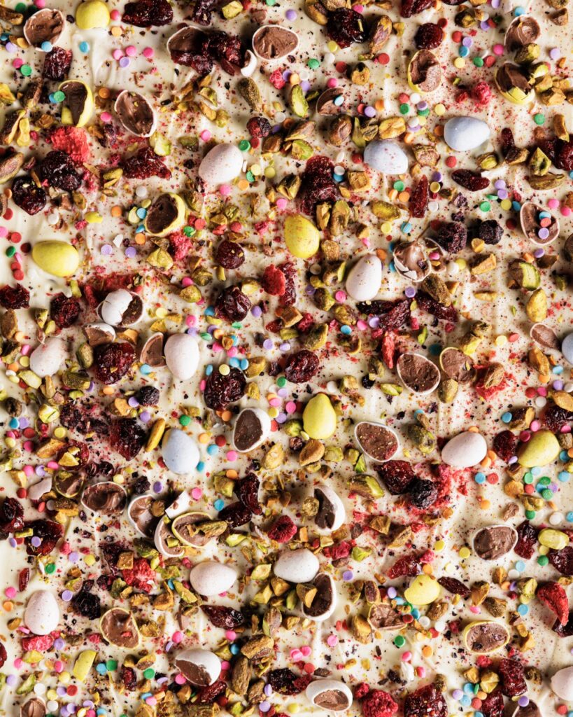 Easter Crack with chocolate egg halves and other ingredients in white chocolate.