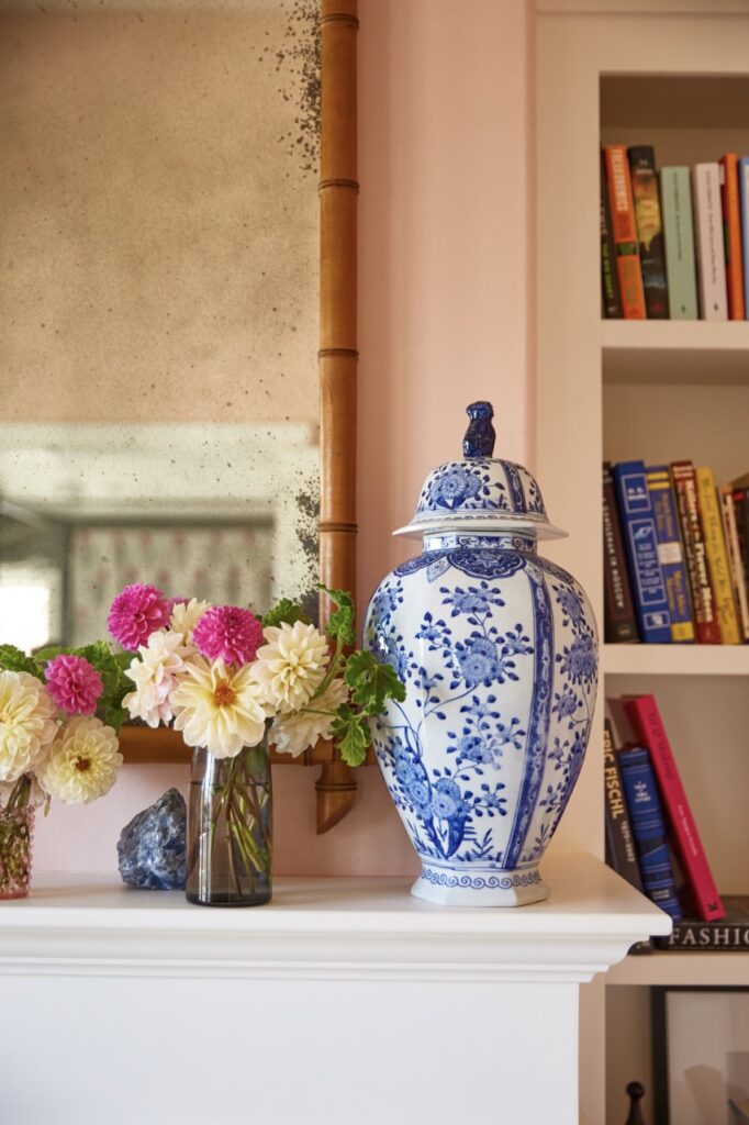 A blue Chinese case sits on a white ledge.