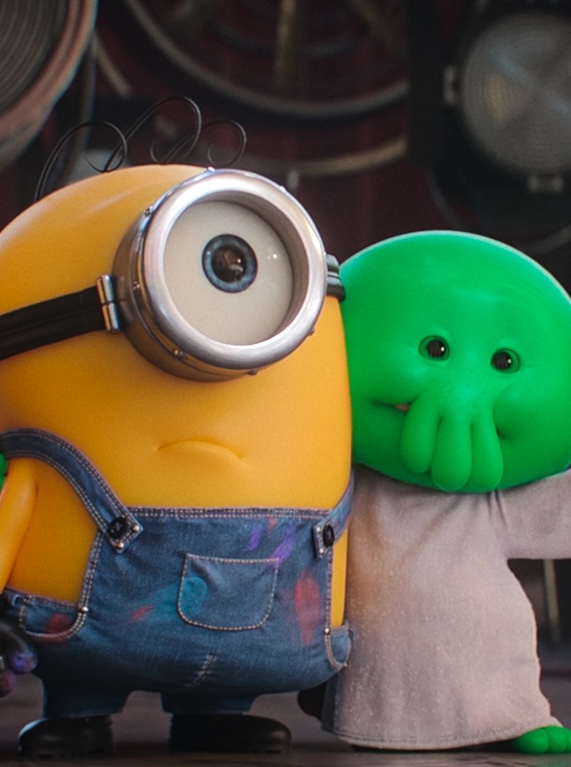 A minion and alien stand side by side in the new movie.