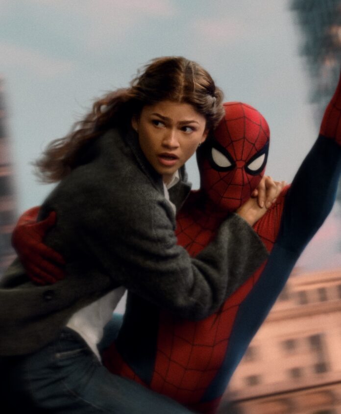 Spider Man carries MJ through the air by a web.