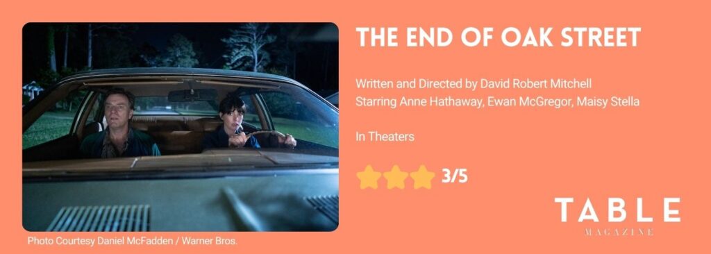 An orange rating card for The End of Oak Street with a photo of Anne Hathaway and Ewan McGregor in a car, giving the film 3/5 stars.